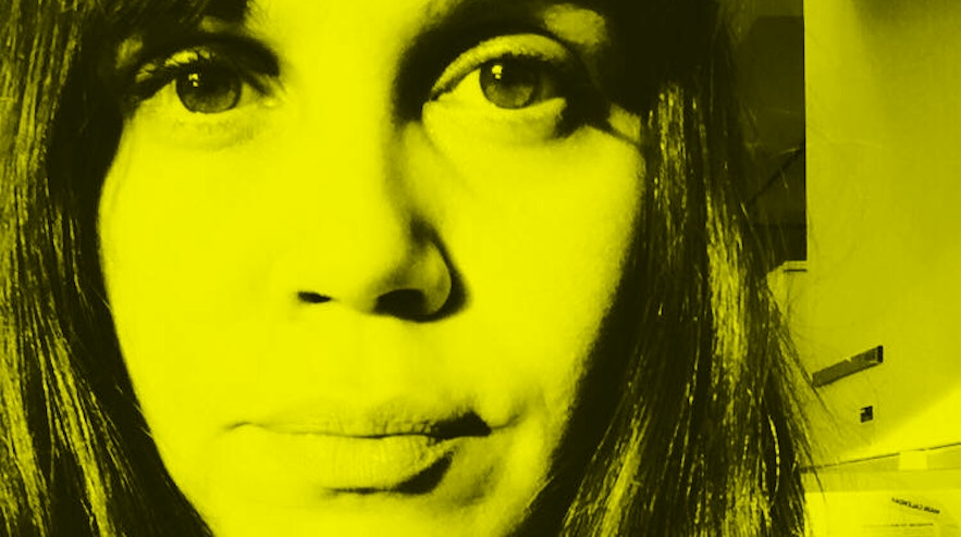 Closeup photo of a persons face with long dark hair